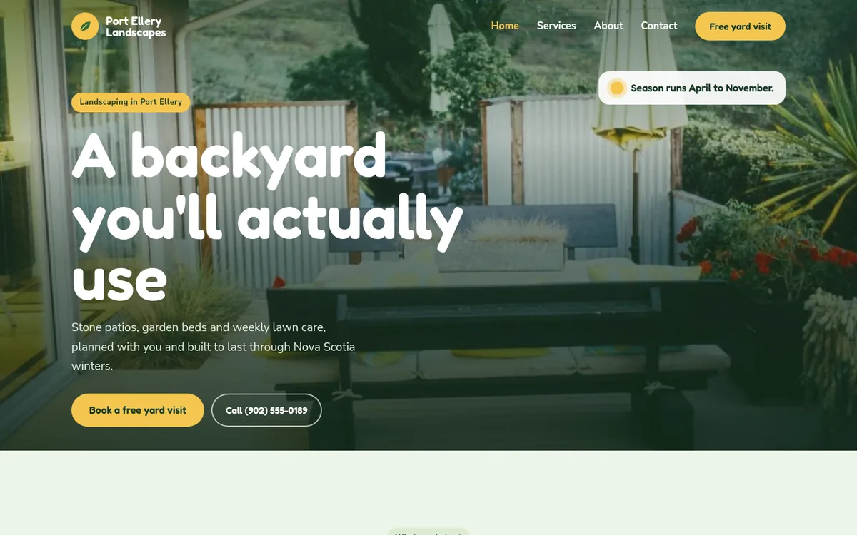 The home page of Port Ellery Landscapes, a sample website, on a computer screen